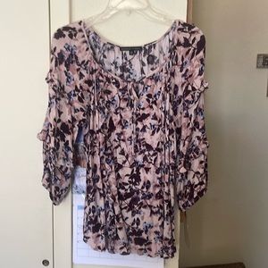 Drawstring neckline top with ruffles lightweight crinkle fabric. Only worn once.